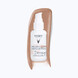 Vichy Capital Soleil UV-Age Daily Pigment Care SPF50 Medium 40ML sfeerbeeld met product textuur Vichy Capital Soleil UV-Age Daily Pigment Care SPF50 Medium 40ML sfeerbeeld met product textuur